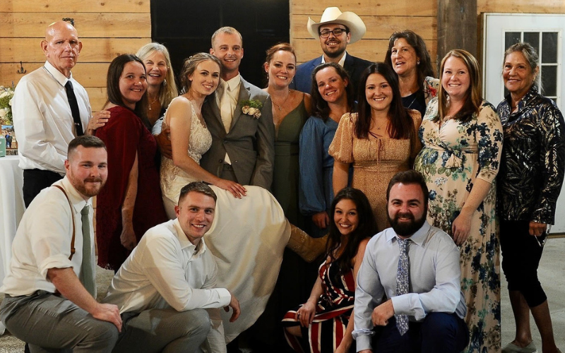 Devine Feed & Pet family posed as a group.